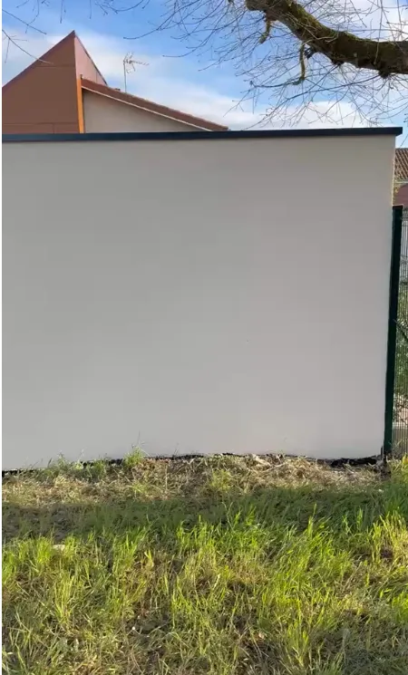 Mur de clôture enduit — après travaux